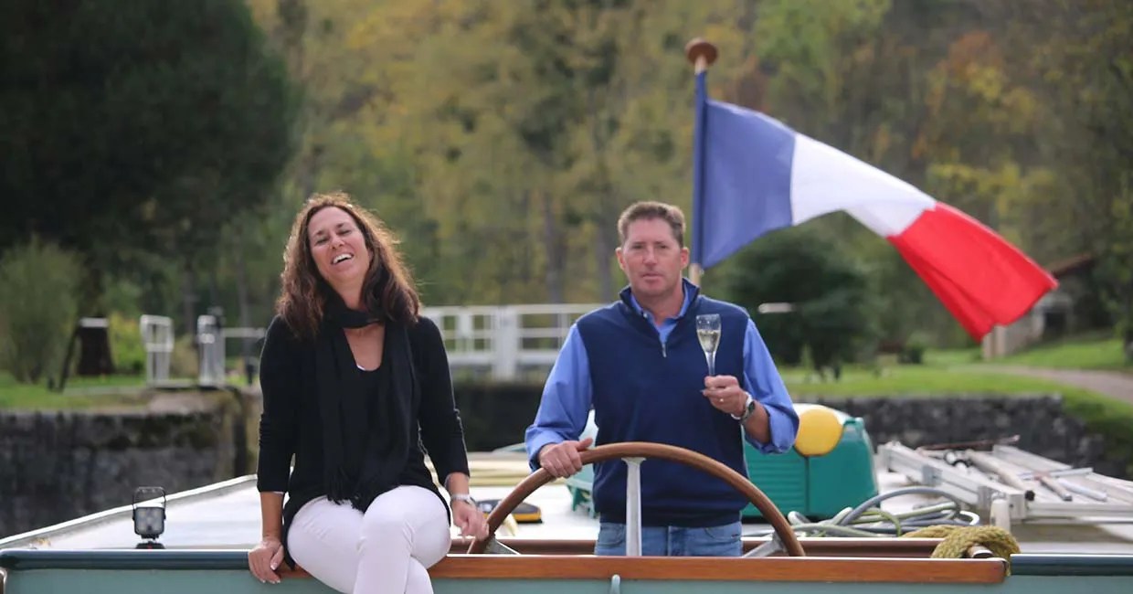 Kim and Chris Dickey at the wheel of the Papillon