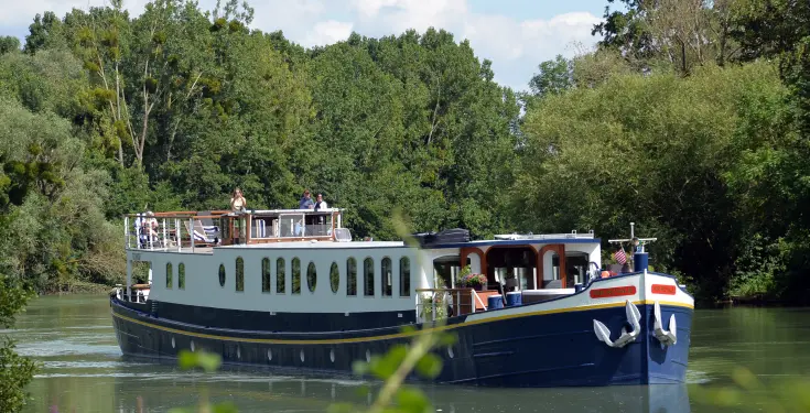 The hotel barge Kir Royale moored in Champagne
