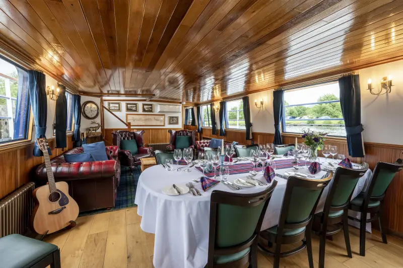The breakfast table in the saloon of the Scottish Highlander