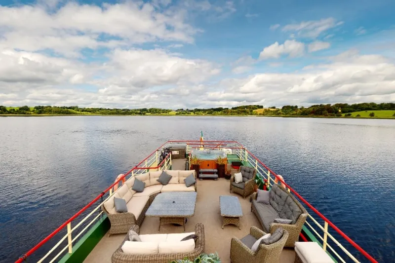 The rooftop sundeck of the Shannon Princess with loungers and the heated spa pool