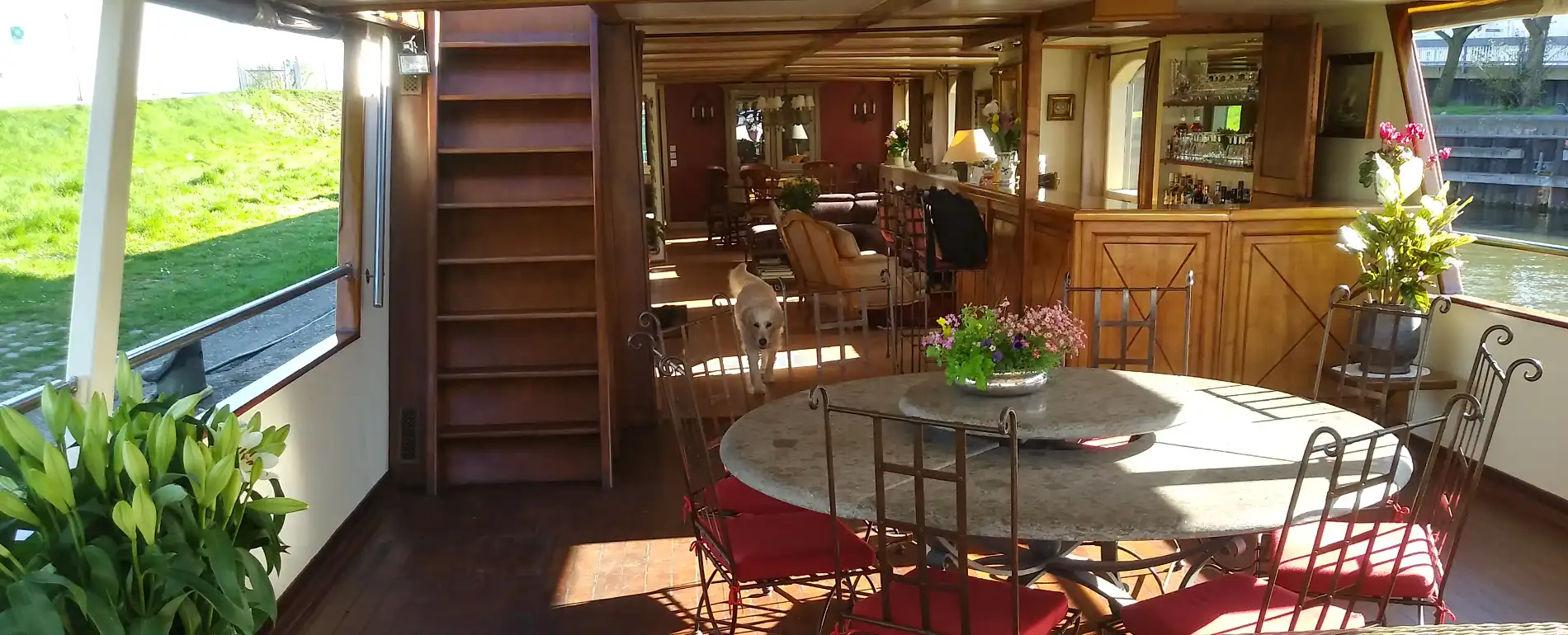 The covered outdoor sitting area on the Aurora's deck