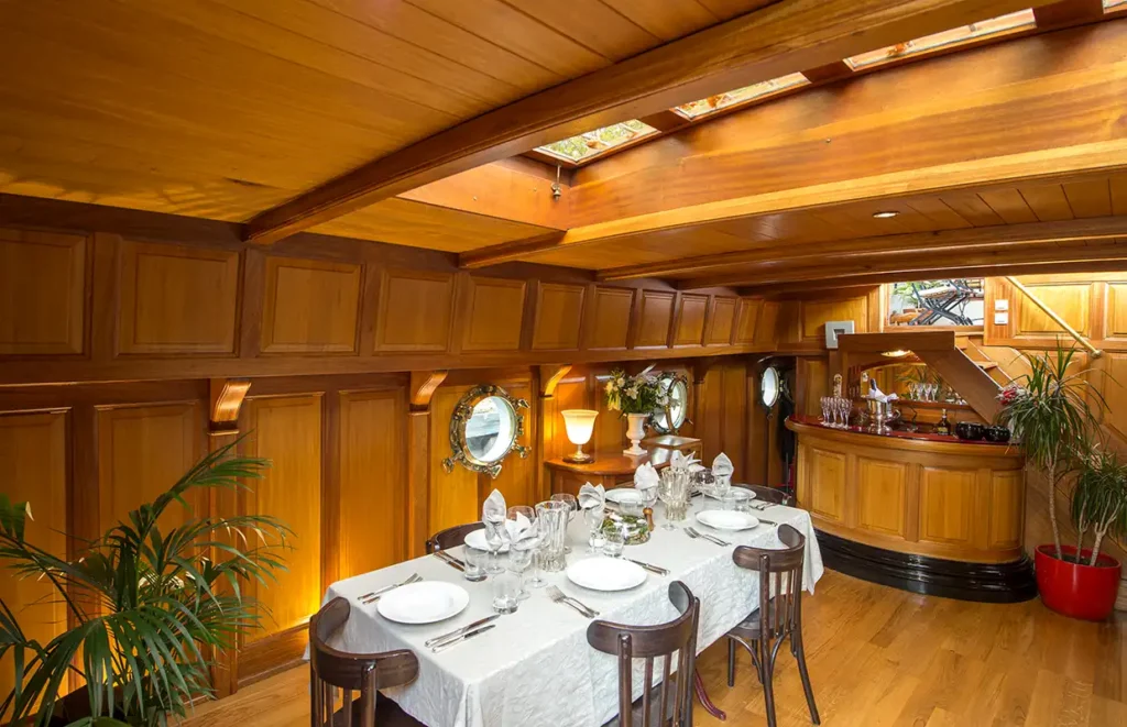 Tango's salon and dining area with leather sofas